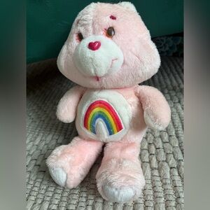 Pink Plush Care Bear with Rainbow Design